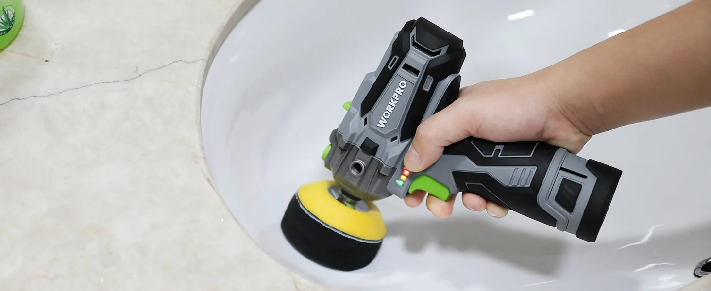 Hand using a power sander on a white floor, showing innovation and quality in a compact tool
