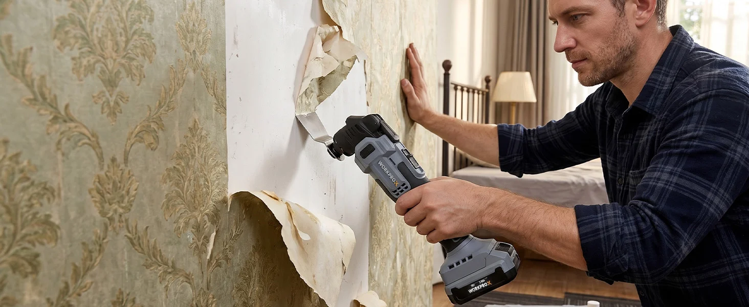 Man using a power drill to remove damaged plaster from a wall, showing innovation and quality in home repair