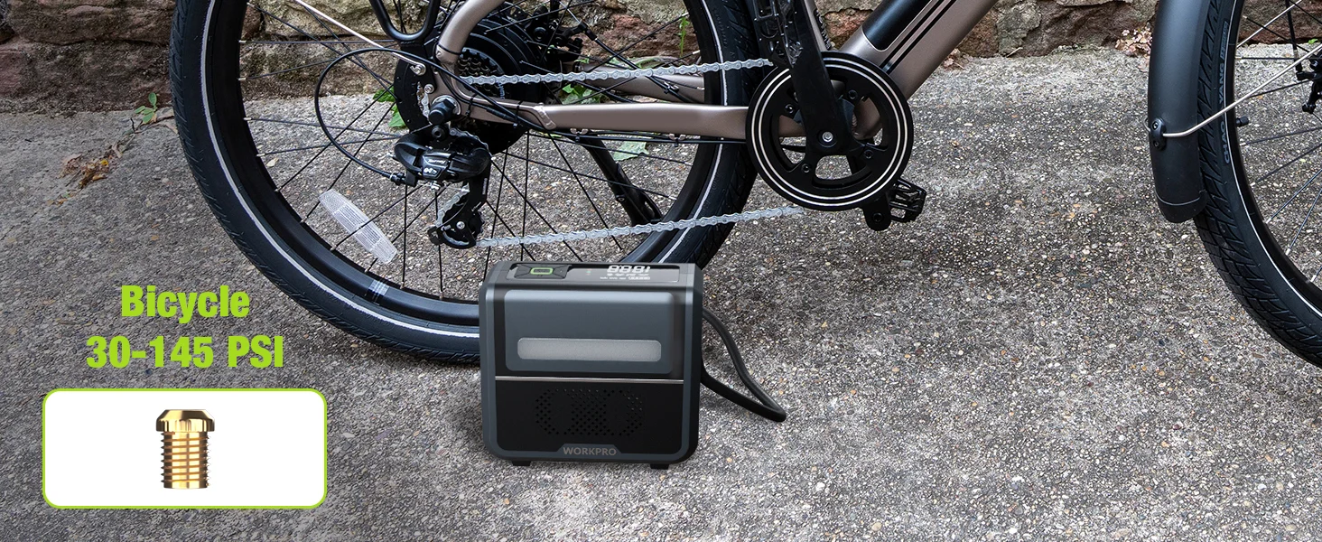 Bicycle tire inflator on asphalt with a gauge, showing 30 to 145 psi for innovation and quality
