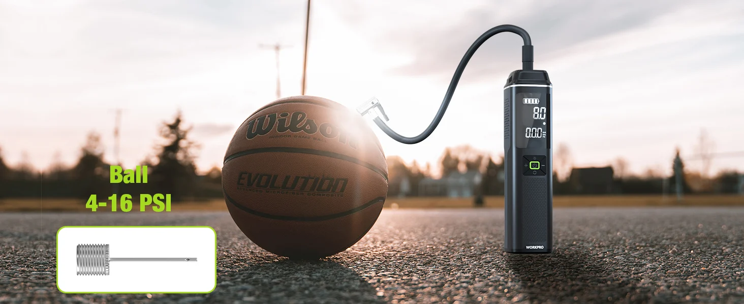 Inflatable ball and portable air pump on a road at sunset, with innovation and quality in a secure setup