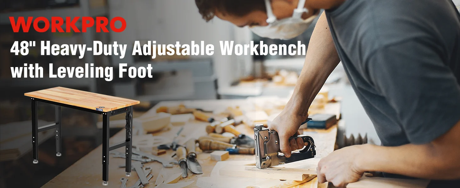Workbench with adjustable leveling foot in a workshop, with tools and wood shavings on the table