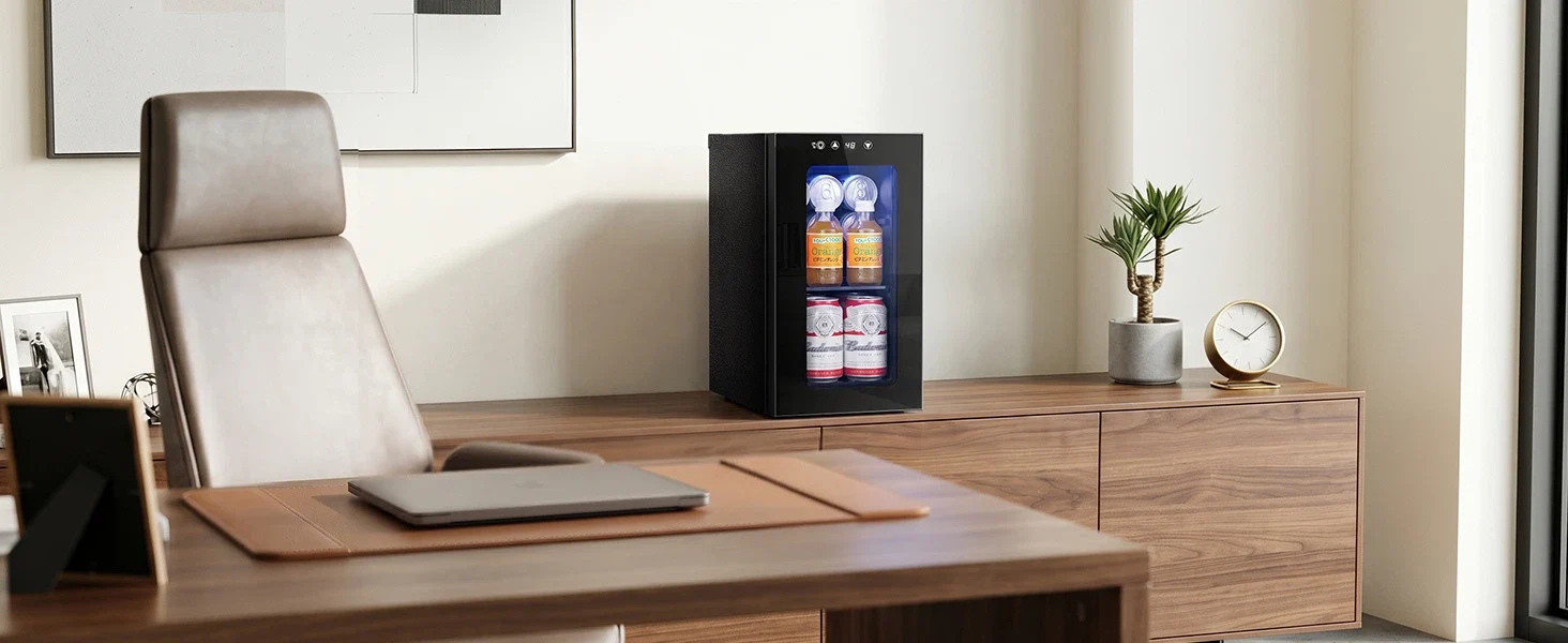 Kismile WC5810 mini beverage refrigerator on a wooden cabinet in an office