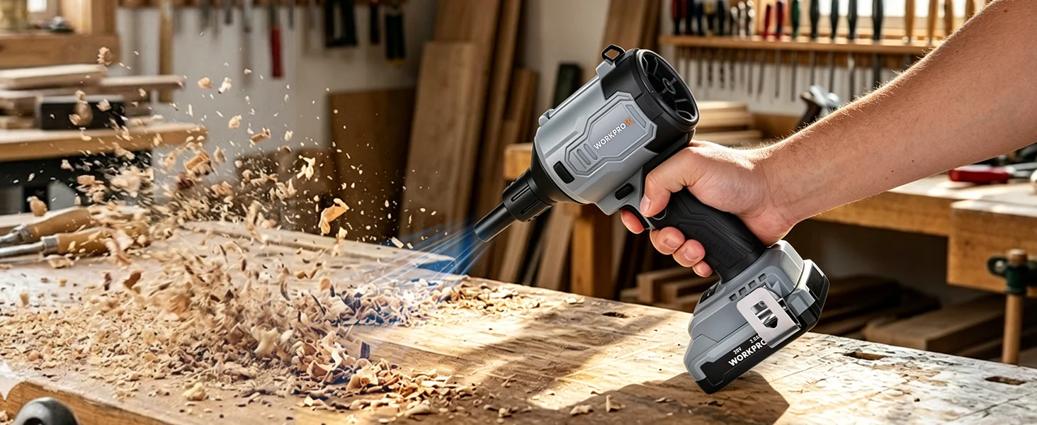 Handheld power tool cutting wood with flying chips in a workshop, showing innovation and quality in use