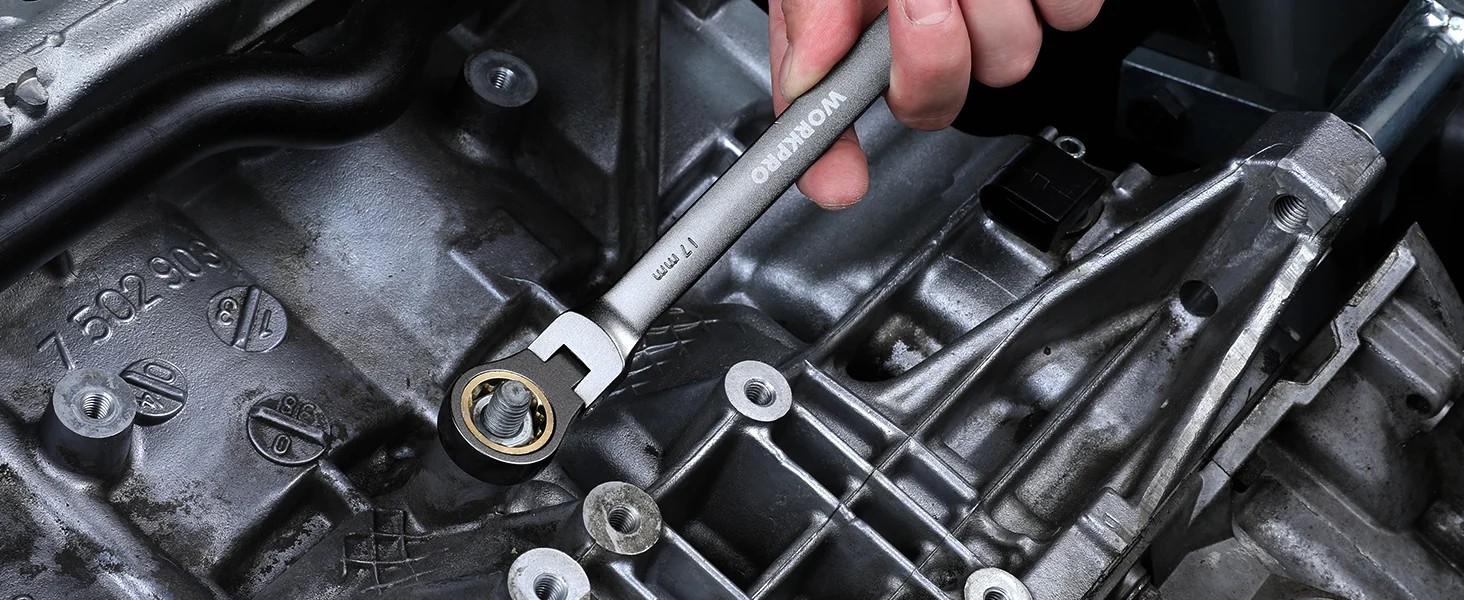 Mechanic uses a wrench on a metal engine part, showing innovation and quality with secure fasteners