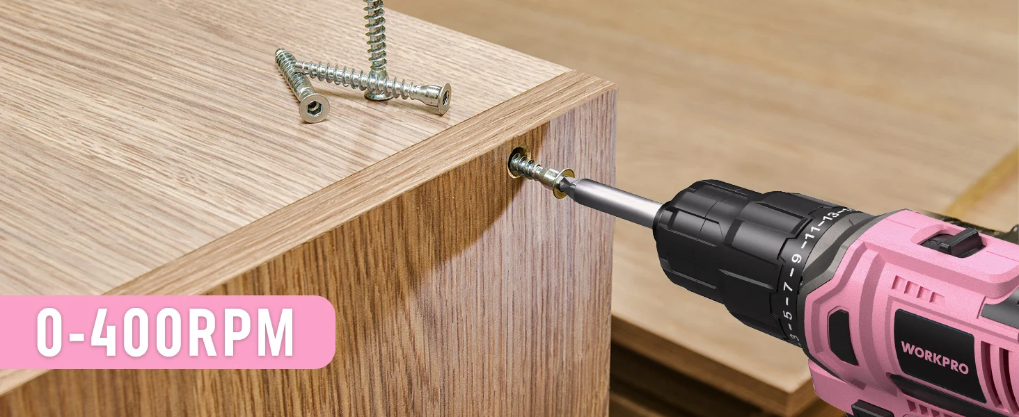 Power drill driving screws into a wooden board, with visible 0 400RPM speed setting and metal bit