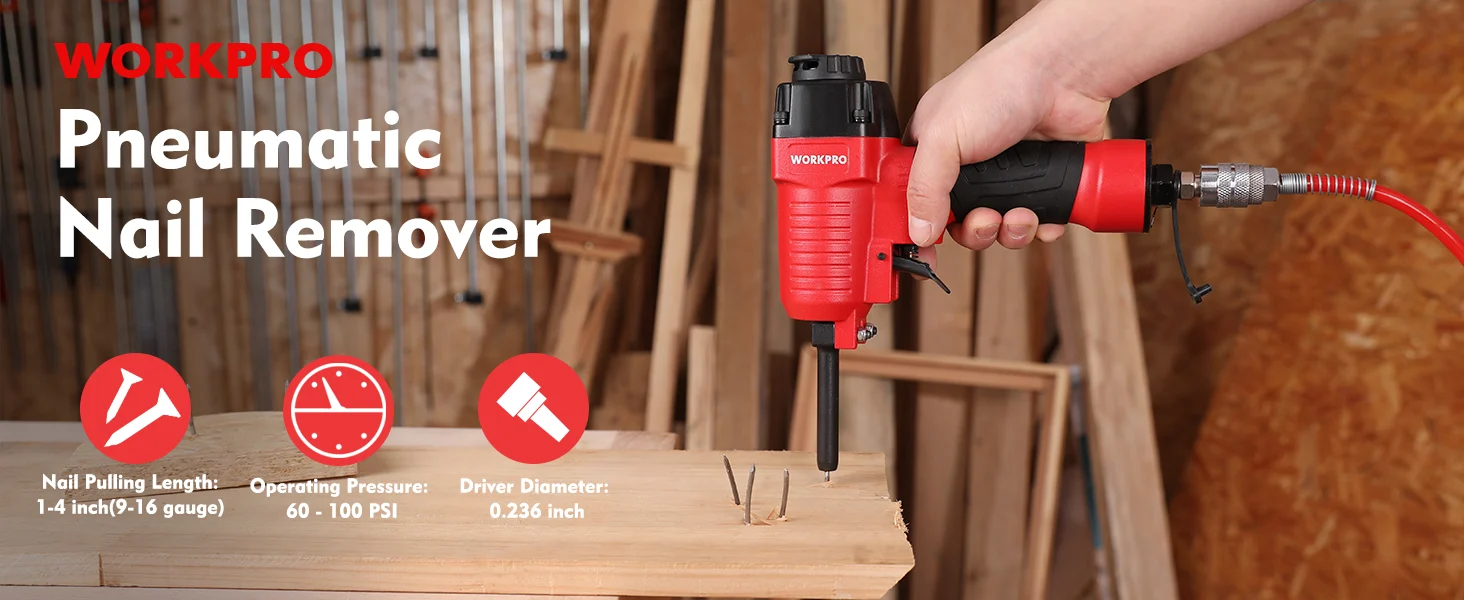 Pneumatic nail remover tool in red and black held over wood boards in a workshop, with innovation and quality