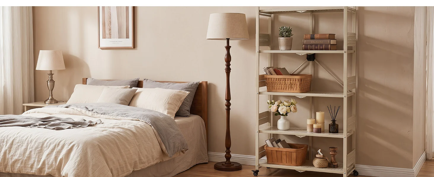 Bedroom setup with innovation and quality, a neatly made bed, and a rolling shelf unit with decor and storage