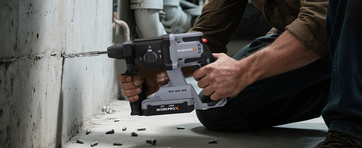 Electric drill in use with a hand drilling concrete, showing innovation and quality in a durable tool