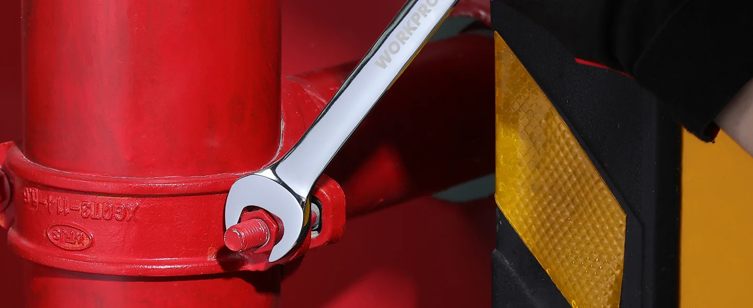 Red metal clamp with a silver wrench and a yellow textured plate, showing innovation and quality details