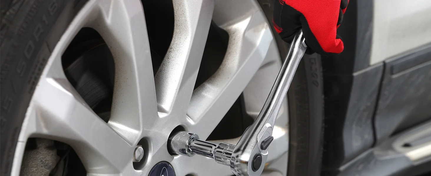 Car wheel and lug wrench with chrome finish, showing innovation and quality in a secure, durable, convenient repair