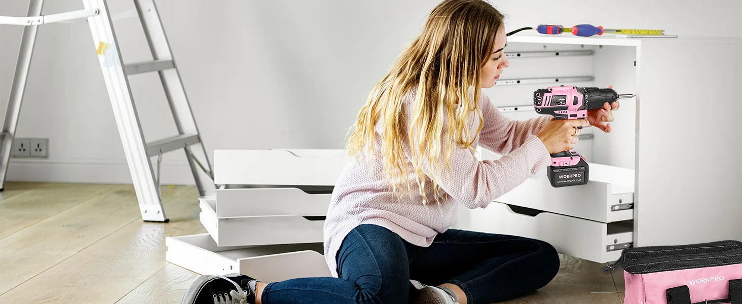Woman installing furniture hardware with a power drill, showing innovation and durable quality in a bright room