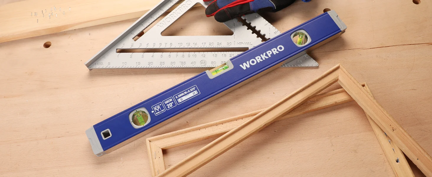 WorkPro spirit level with visible measurement markings, innovation and quality tools on light wood