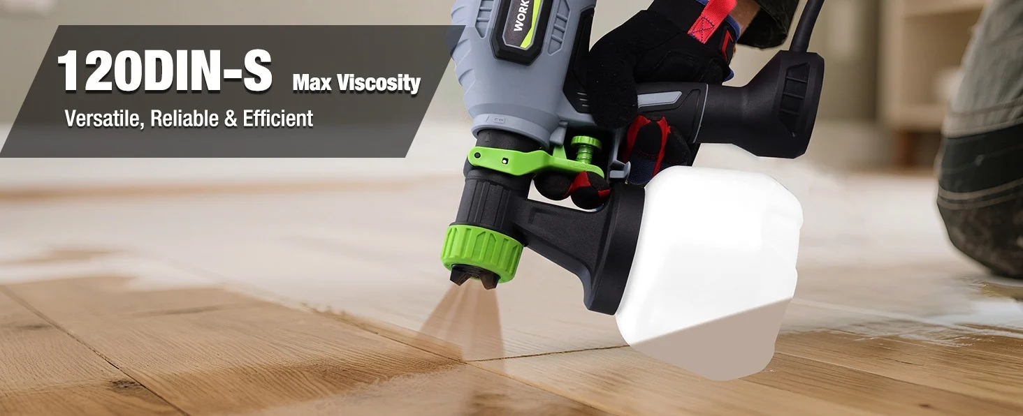 Handheld floor tool with green and black parts and a white tank, shown cutting along a wooden surface