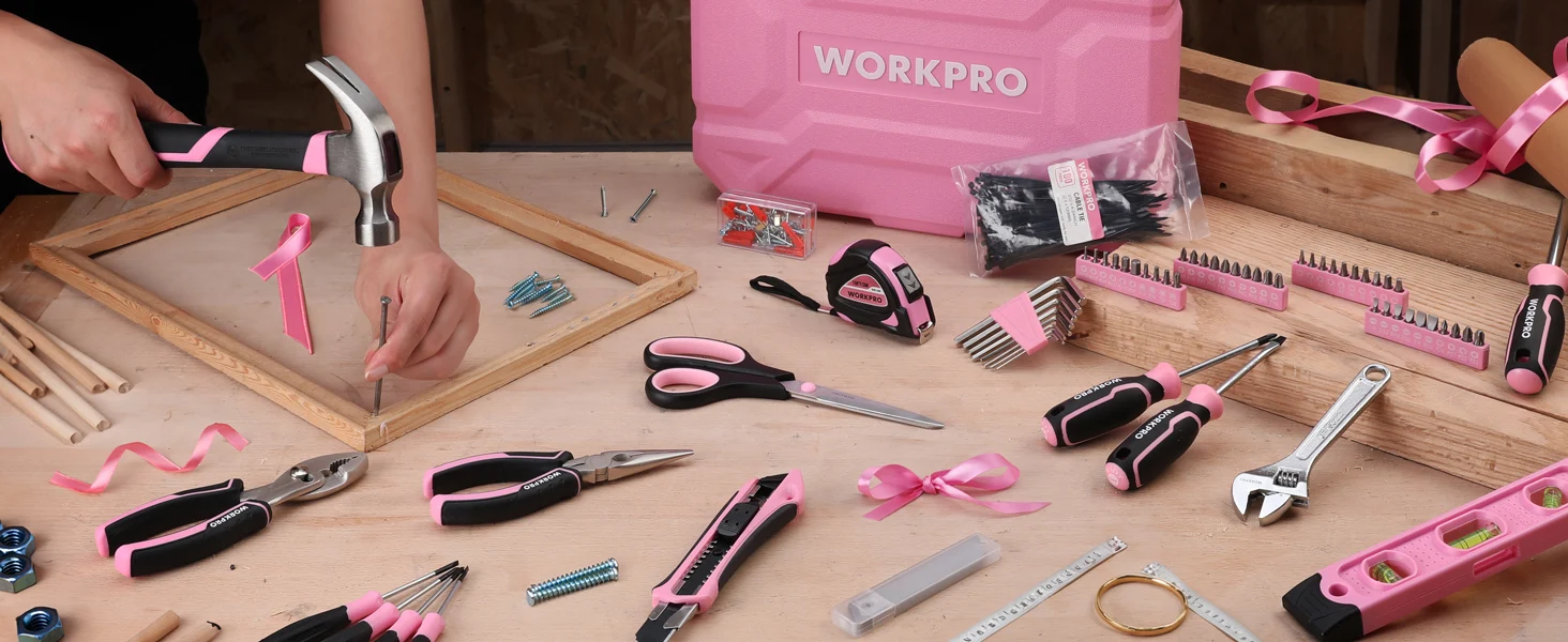 Hand tools and fasteners on a wooden workbench with a pink Workpro case, showing innovation and quality