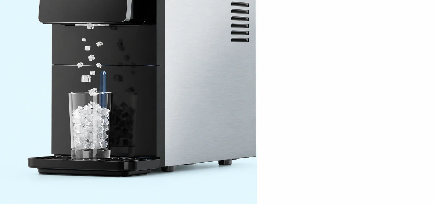 Kismile 58015RIM0 countertop nugget ice maker dispensing ice into a glass on the drip tray
