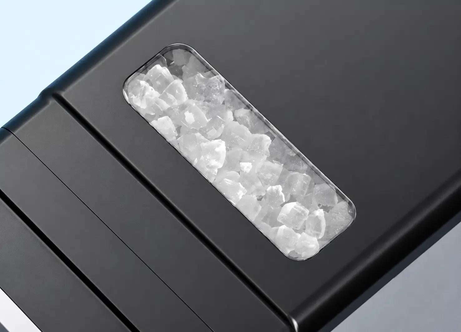 Nugget ice visible through the top viewing window of the Kismile 58015RIM0 ice maker
