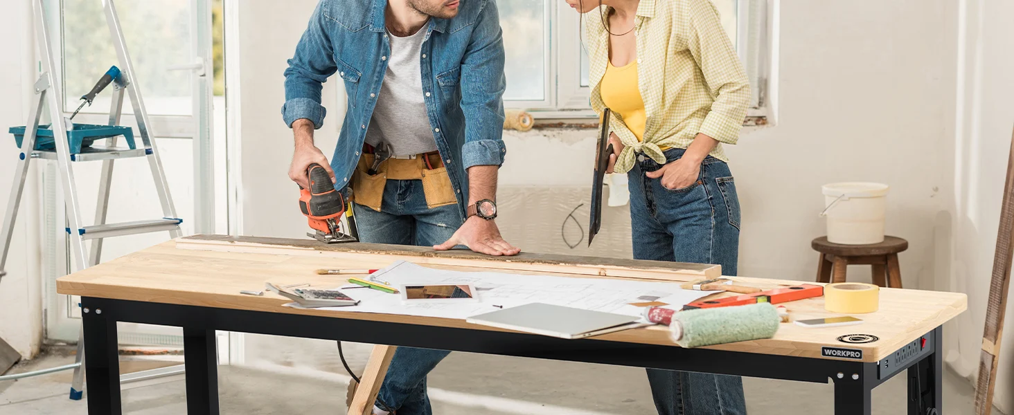 Two workers installing a wooden panel at a workbench, using tools and showing innovation and quality