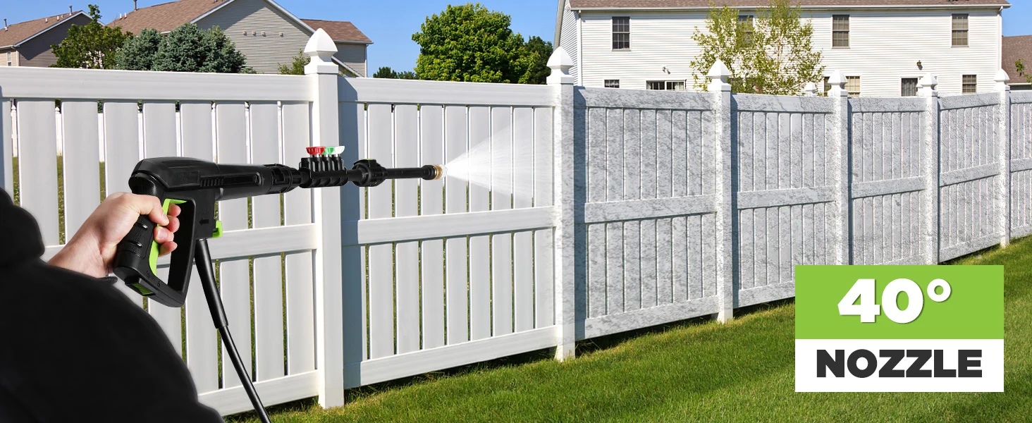 Garden hose nozzle spraying water from a handheld sprayer on a white fence, with 40 degree nozzle angle