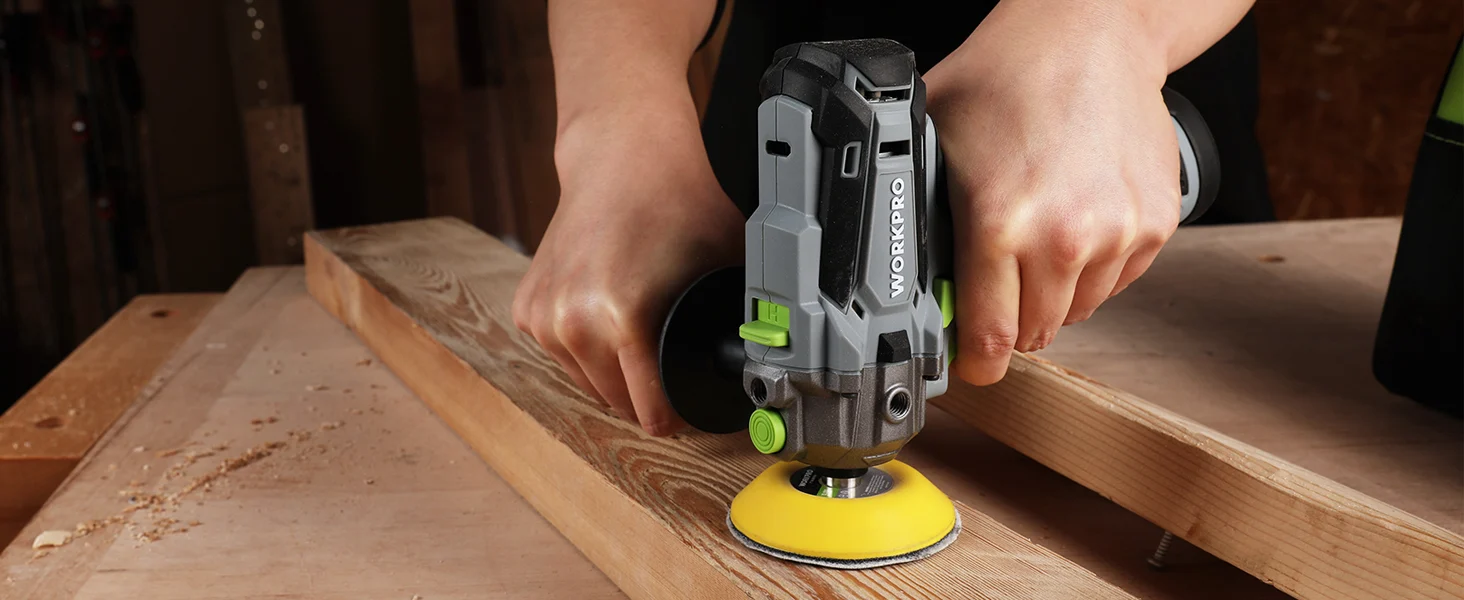 Handheld power tool cutting wood plank with innovation and quality, showing a yellow suction base and metal head