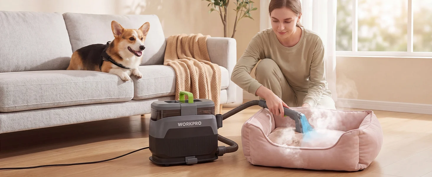 Woman uses a vacuum cleaner to clean a pink pet bed in a bright living room with a dog on the sofa