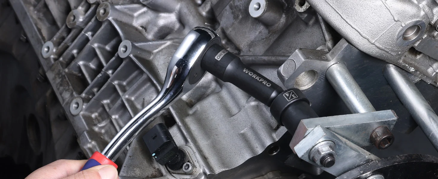 Mechanic tool and hand working on a metal gearbox, showing innovation and quality in secure, durable assembly