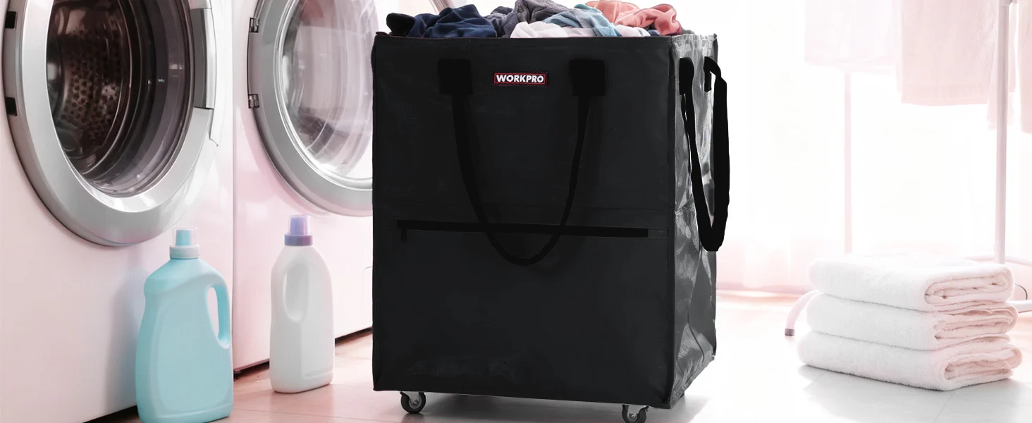 Laundry cart with folded clothes on wheels beside washing machines, with visible WorkPro label and sturdy black bag