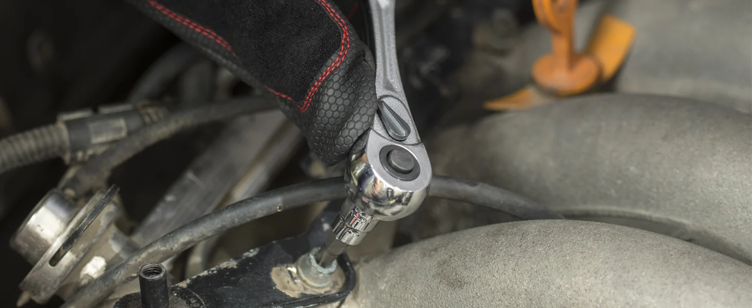 Innovation and secure quality are shown in a metal hydraulic hose fitting with hex bolts and textured rubber cover